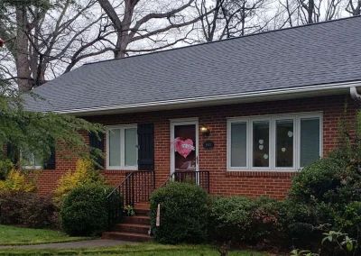 Residential home in Richmond, VA with a asphalt roof, installed by A Plus Roofing.