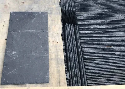 Close up photo showing natural slate roofing tiles used for slate roof installation in Richmond, Virginia.